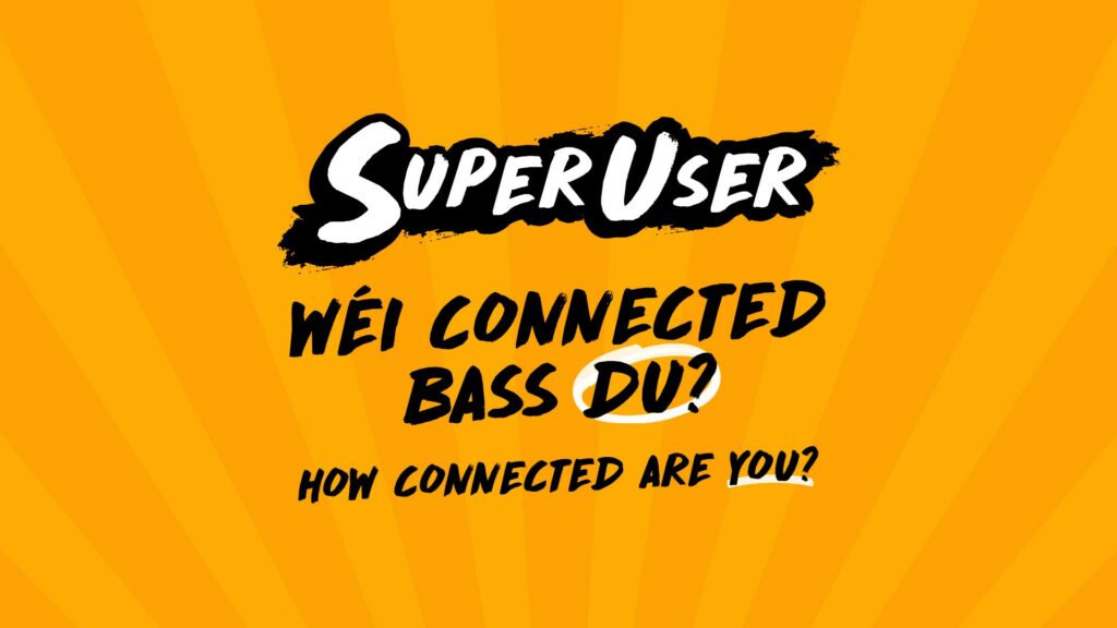 Le texte suivant est écrit sur un fond orange : Superuser - Wéi connected bass du? How connected are you?